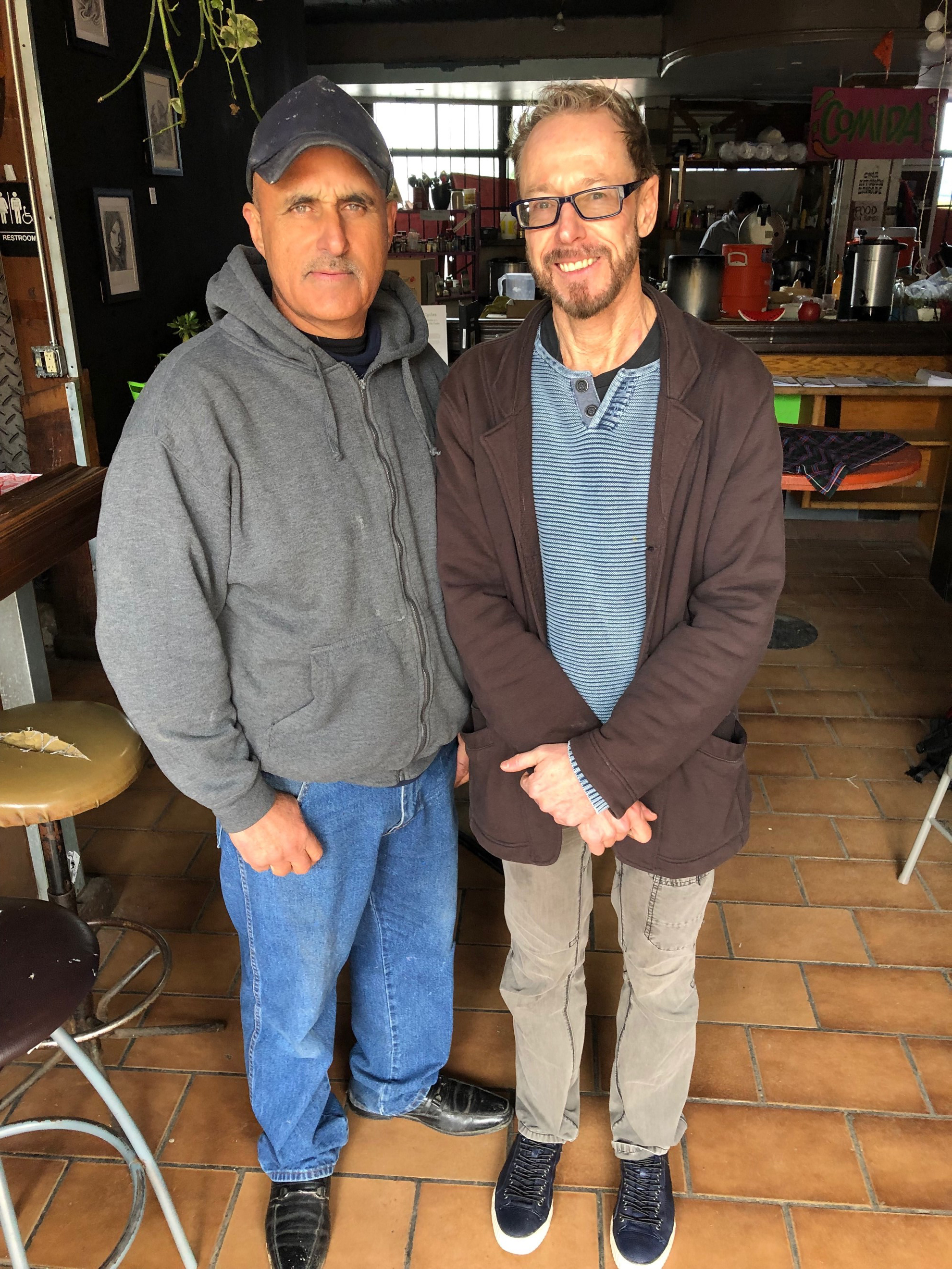 Nacho Davis with Robert McKee Irwin at Humanizing Deportation exhibition in Tijuana, February 2019