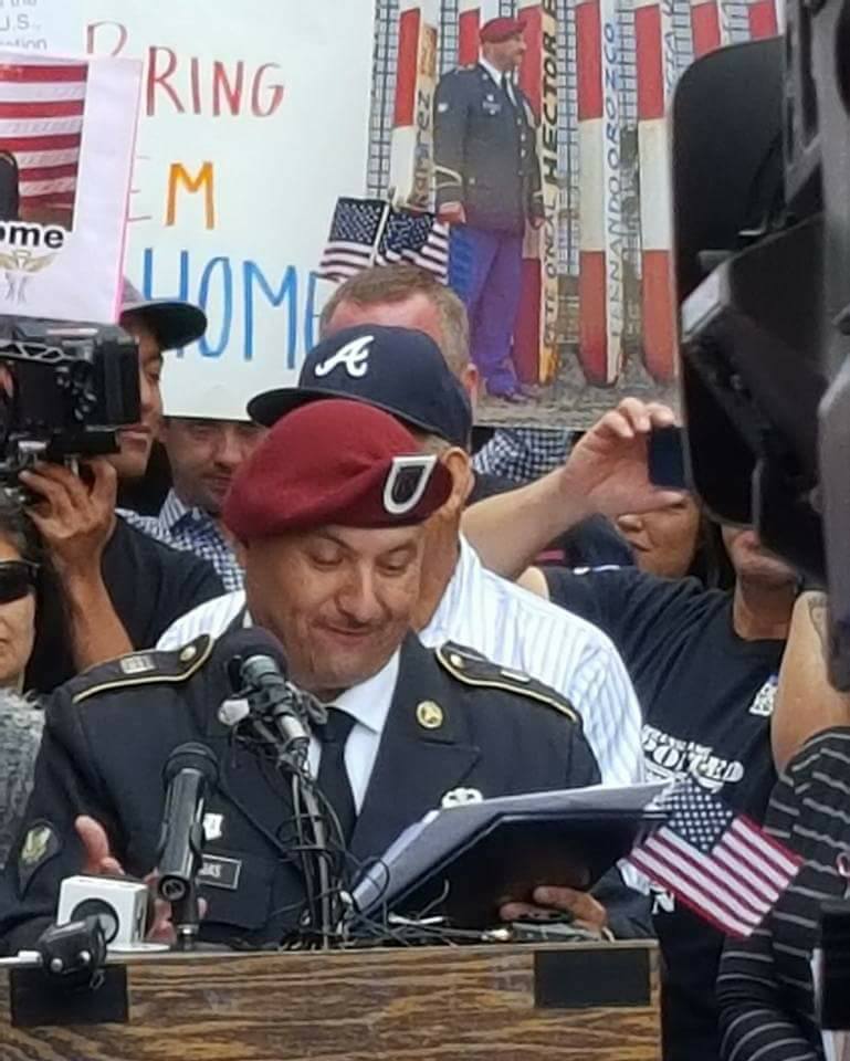 hector barajas standing at a podium in military uniform