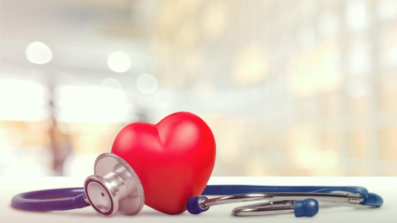 Stethoscope coiled around heart