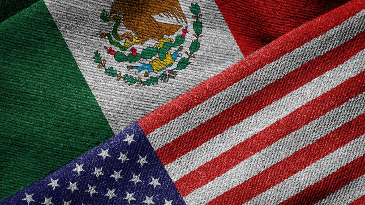 US and Mexico Flags laying side by side