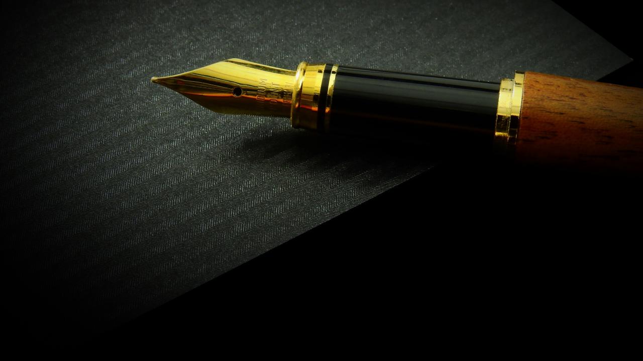 Photo of Pen and Portfolio