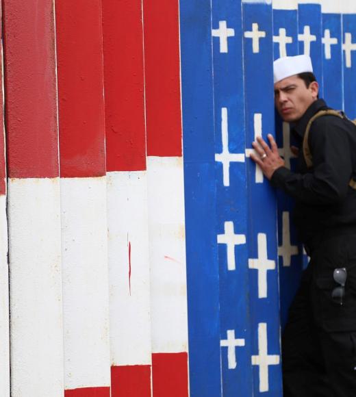 Alex Murillo at border wall in Friendship Park, Tijuana
