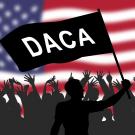 Silhouette with Flag that reads "DACA"