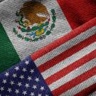 US and Mexico Flags laying side by side